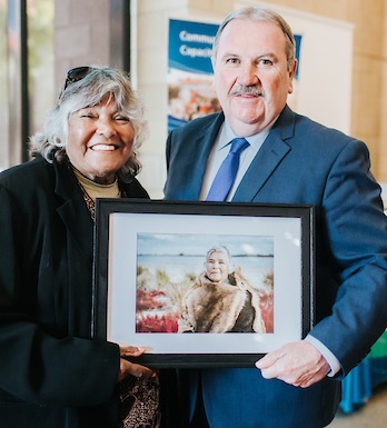 Theresa Walley and Mayor Sammels with portrait