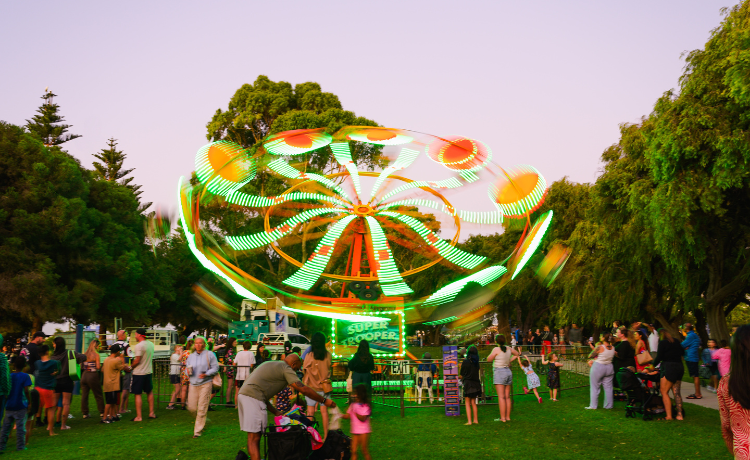 A spinning amusement ride in Churchill Park