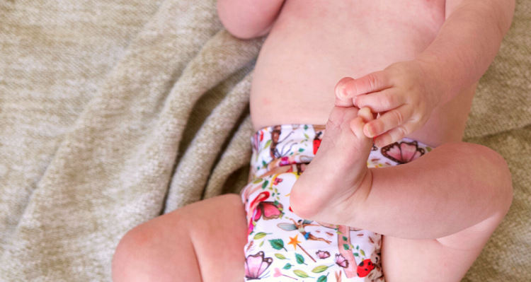 Baby in a resuable nappy.