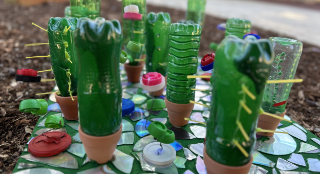 South Coast Baptist College. ‘The Garden of New Life’, 2023, CD’s, plastic bottles, bottle tops, solar powered lights. Image credit: courtesy the artist.