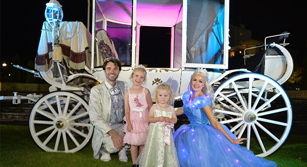 Cinderella and Prince Charming with children.