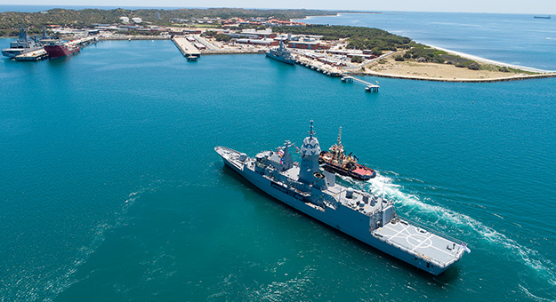 Aerial view of HMAS Stirling returning to Fleet Base West on Garden Island.