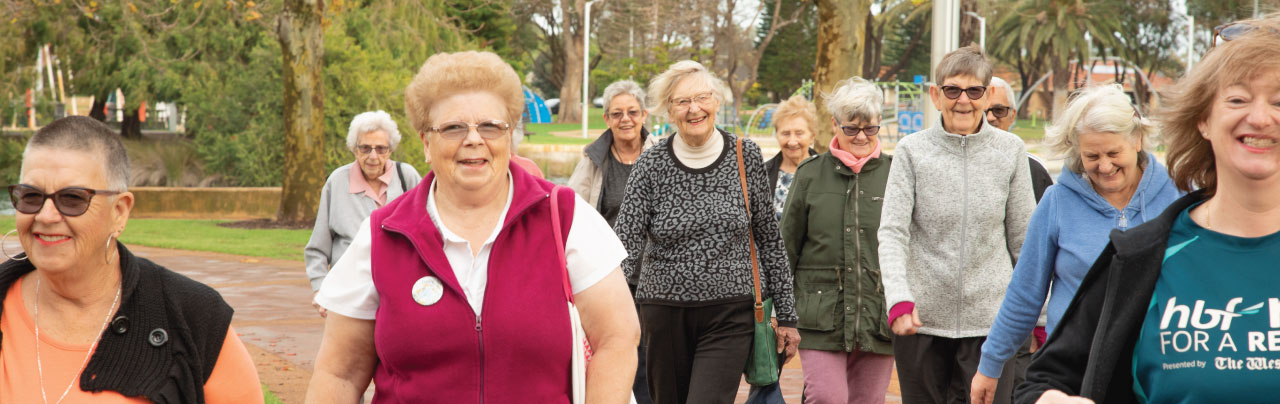 a group of senior citizens walking