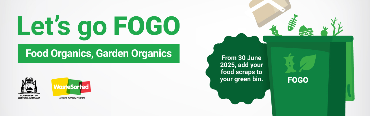 Three bins marked recyclables, FOGO and general waste.