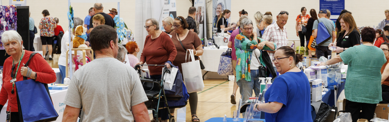 Older community memebers enjoying an event