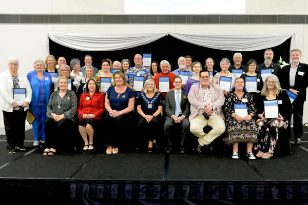 All nominated volunteers on stage at the Volunteer Recognition Evening 2022