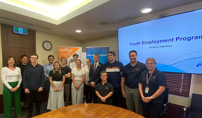 YEP participants in the boardroom on their first day.