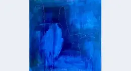 a blue painting with white dots