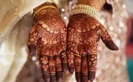 a hands with henna designs