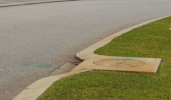 a manhole cover on a road