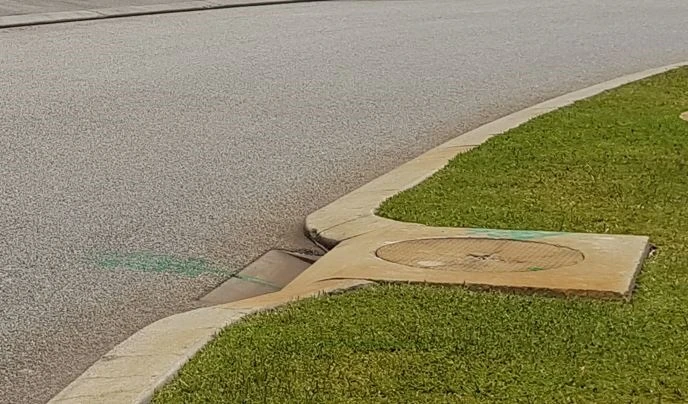 a manhole cover on a road