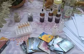 a table with bottles and cards