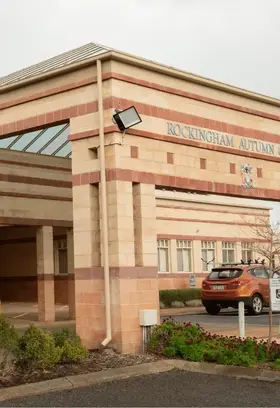 a building with a car parked in front of it