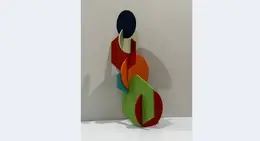 a colorful sculpture on a wall