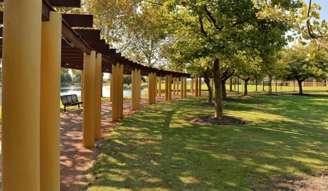 a bench under a covered walkway