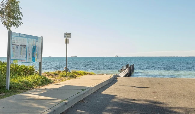 a road with a sign on the side of it