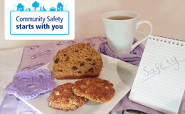 a plate of cookies and a cup of tea
