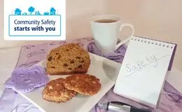 a plate of cookies and a cup of tea