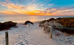 a path leading to a beach