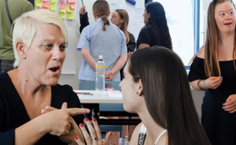 two women communicating using sign language