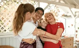 a group of people hugging