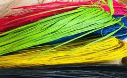 a close up of colored straws