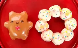 a donut and a donut with frosting