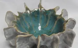 a ceramic bowl with a blue center