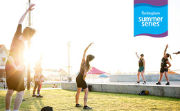 People doing dance fitness in the park
