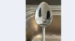 a spoon with water on it
