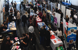 a group of people at a convention