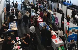 a group of people at a convention