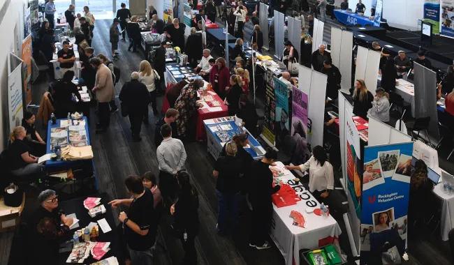 a group of people at a convention