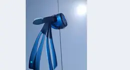a blue flippers attached to a string
