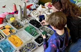 a group of people playing with objects