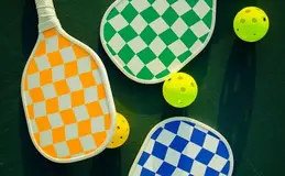 a paddles and balls on a surface