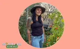 a woman wearing a hat and jeans