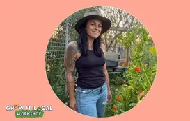a woman wearing a hat and jeans