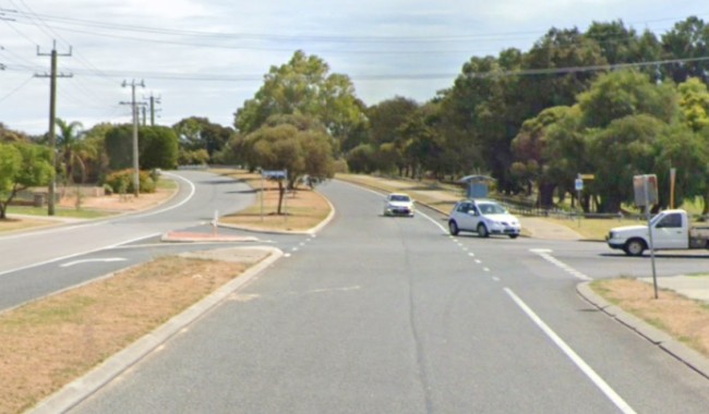 cars on a road with trees