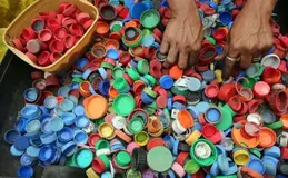 a pile of colorful plastic caps