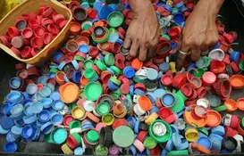 a pile of colorful plastic caps