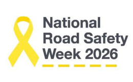 a yellow ribbon with black text