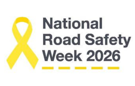 a yellow ribbon with black text