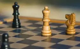 a chess board with a chess piece on it