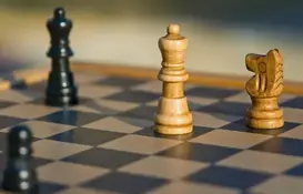 a chess board with a chess piece on it