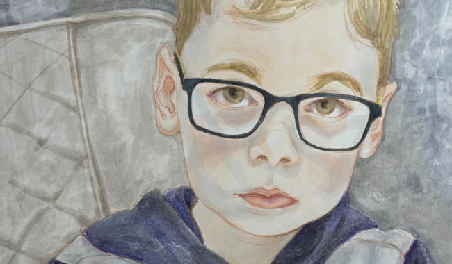 a boy wearing glasses