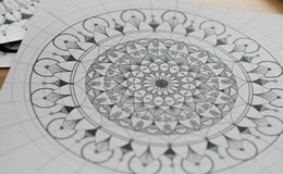 a drawing of a mandala