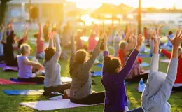a group of people doing yoga