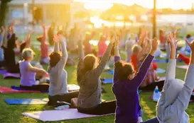 a group of people doing yoga