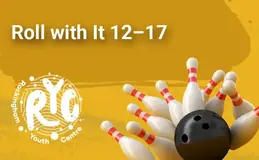 a bowling ball hitting pins
